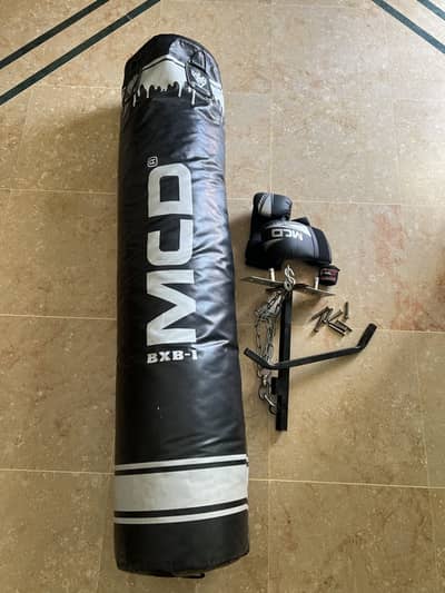 Mcd punching bag (5ft) filled with boxing gloves and wall mount