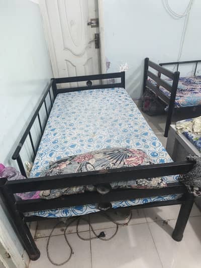 single iron bed with free mattress