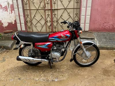 Selling my Honda cg125 red color 2023 model contact number 03713892006