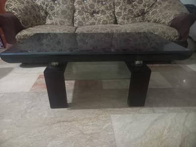 Glass table in good condition available