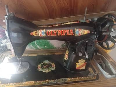 Sewing machine with electric motor