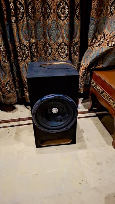 Kenwood KFC-W3010 12" subwoofer housed in a custom black cabinet.