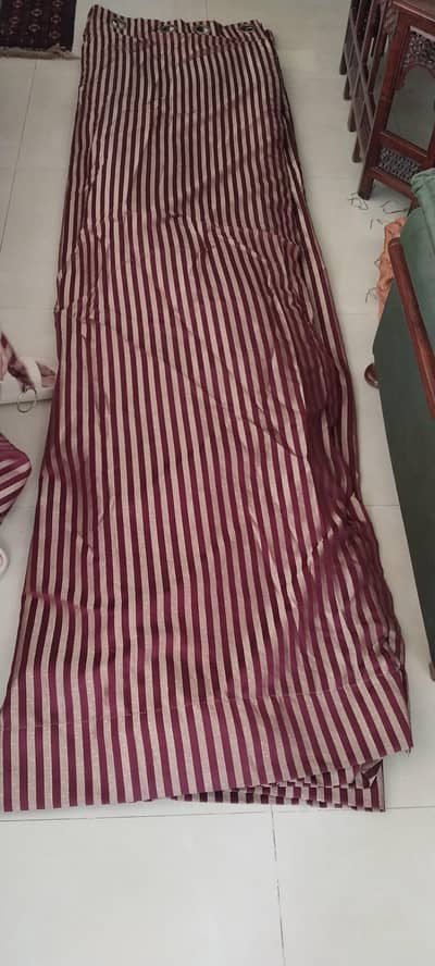 2 red line pattered curtains