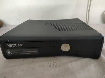 X Box 360 with 2 Wireless remotes and Multiple Batteries & Games