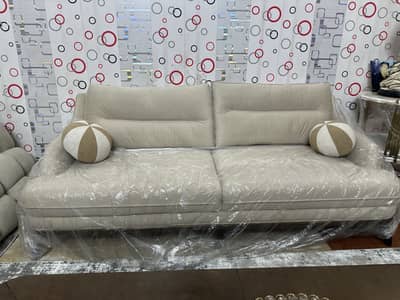 7 seater sofa 1 woden box and 1 table