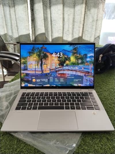 Hp Elitebook 1040 G7 . . Core i7 10th Generation laptop(x360 convertible