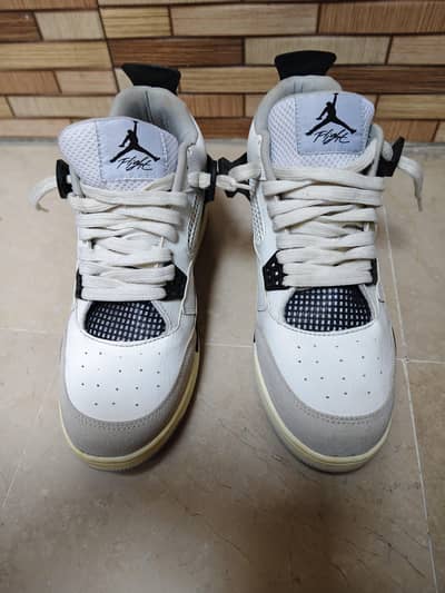 Air Jordan 4 Retro Mid Military Black size 45 came from uk.