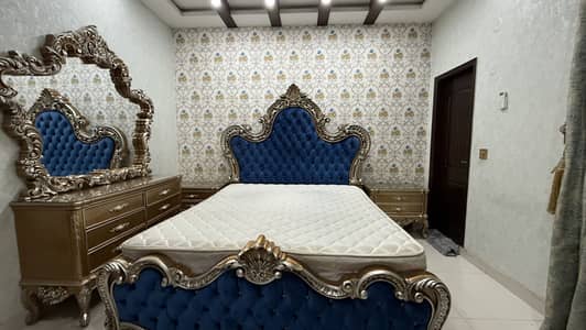 King size bed set with 2 side tables dressing table and with frame .