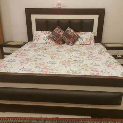 wooden king size bed with 2 side table and dressing with good condi
