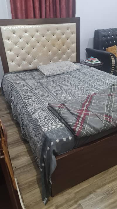 Queen size wooden bed