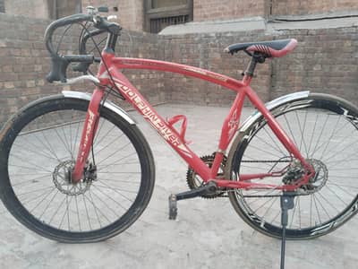 racing bicycle|hybrid bicycle|sports made