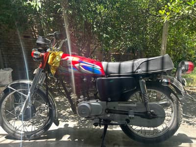Honda 125 2021 model. Number All punjab. With Double Saman .