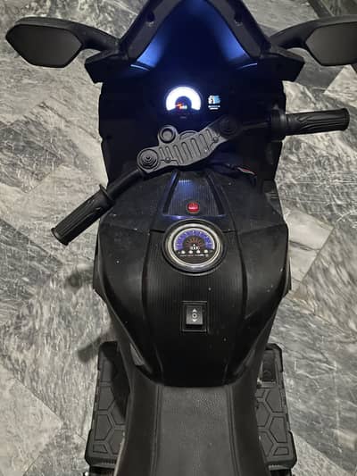 Aprilia-Style Kids Electric Ride-On Motorcycle – Black”