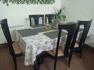 Double layered dining table with chairs