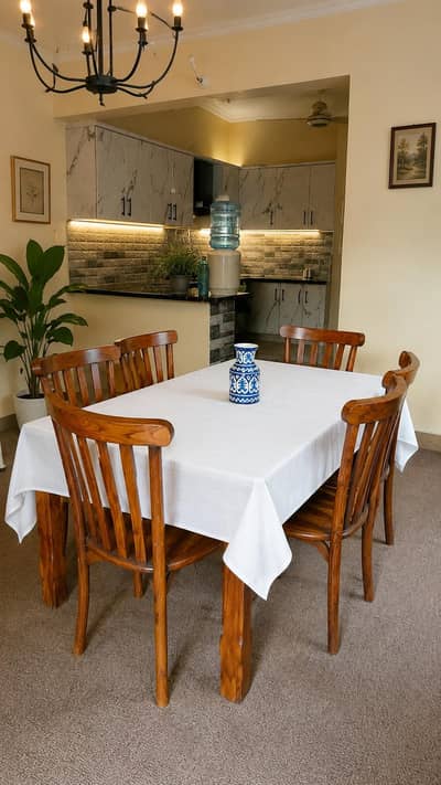 Selling this 6 chairs pure sheesham dining table.