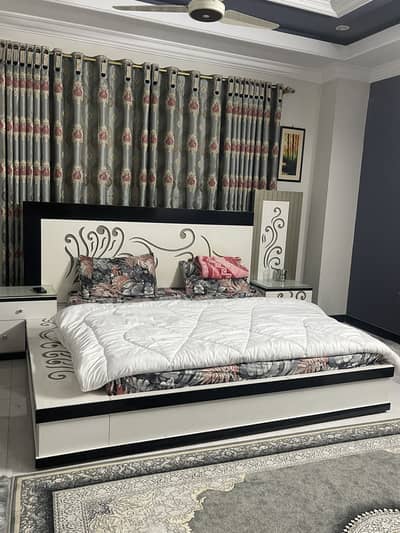 Double bed and side tables