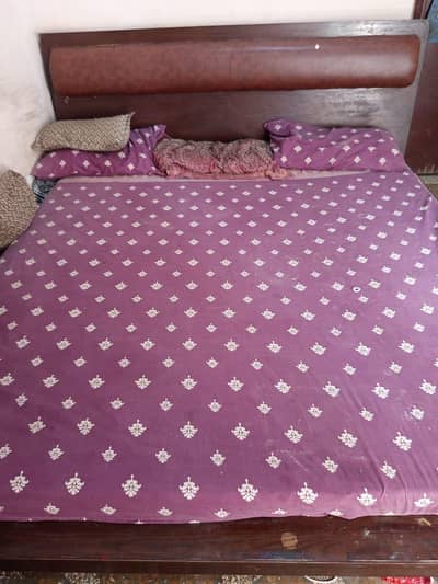 Bed with side table