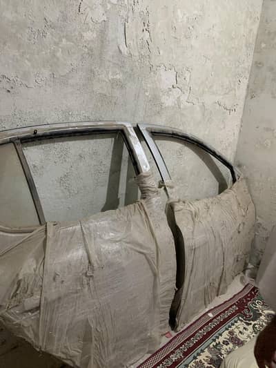 vitz 2000 model 4 doors and bonnet in silver colour