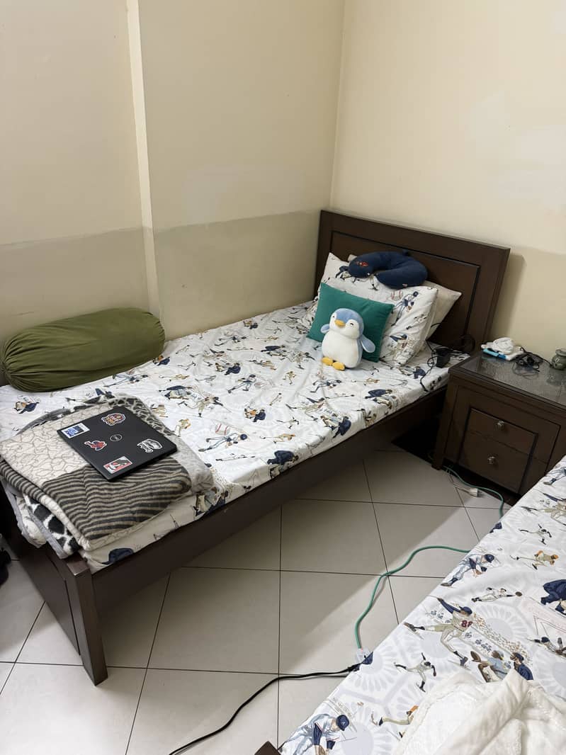 2 SINGLE BEDS WITH SIDE TABLE 1