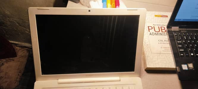 Mackbook Genuine but not turning on due to battery and charger