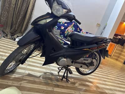 Super pawer scooty