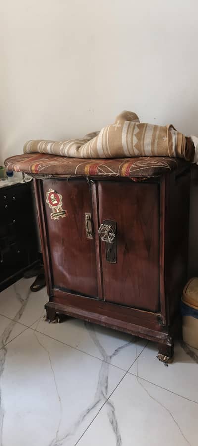 Iron stand with cupboard for sale