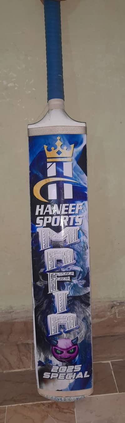 Haneef sports official tapeball bat.