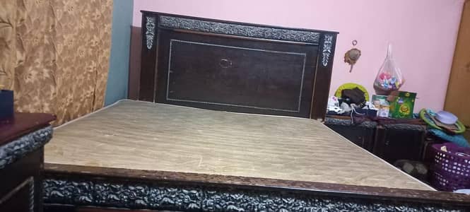 double bed. with dressing table. side tables.