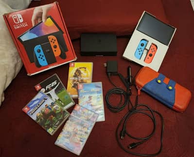  Nintendo switch complete bundle / 5 Games / dock ,charger & case