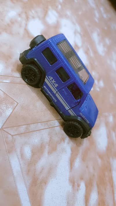 Blue metallic die-cast Jeep-style toy