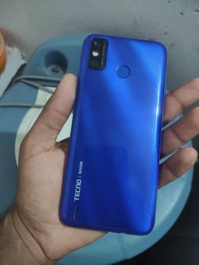 Tecno Spark 6 4/64 with charger. . .
