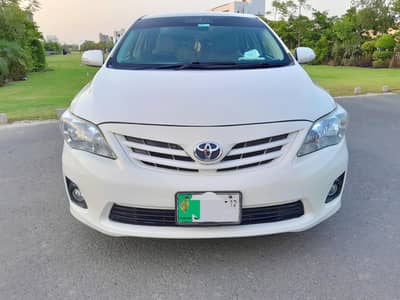 Bank Manager used Toyota Corolla XLI 2012 converted GLI  White Color
