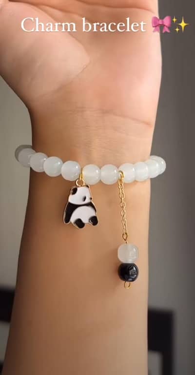 Features elegant white/milky beads