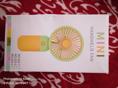 Mini hand-held fan