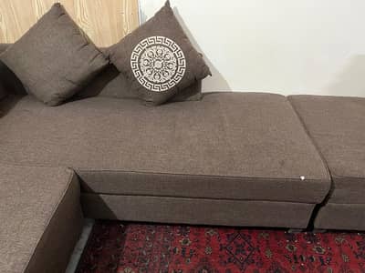 Urgent sale,One year carefully used 10/10 conditions sofa with table