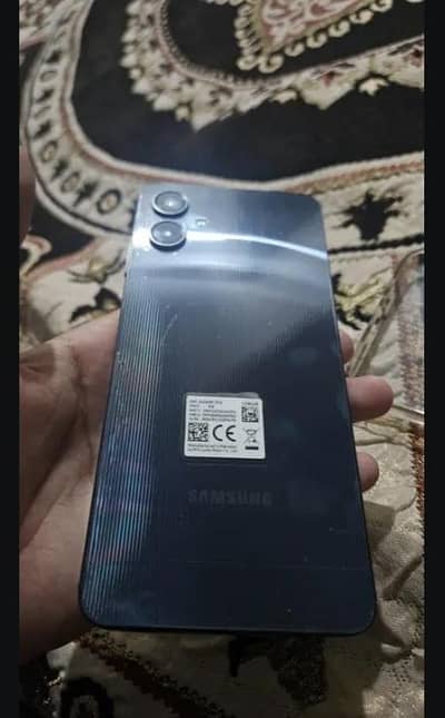 Samsung Mobile A06 with  25W fast Charger.