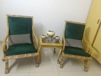 wooden chairs with coffee table