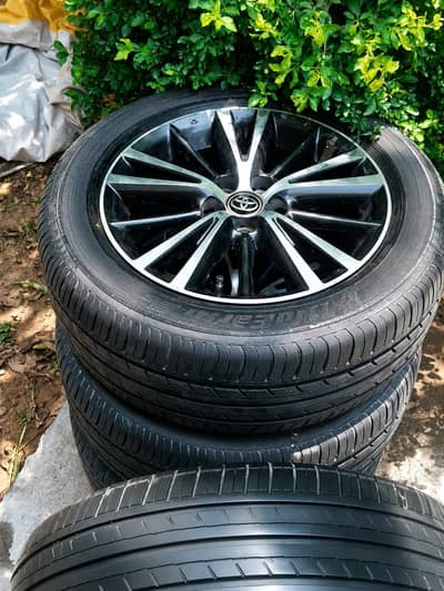 Toyota Corolla grande original rims with yokohama tyres 16 " rims