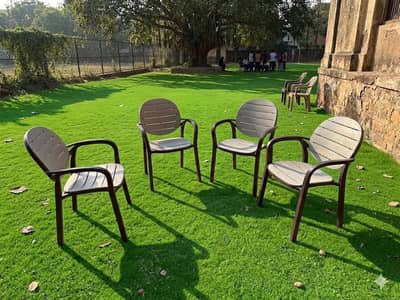 4 chair one plastic table 10 x 10 condition