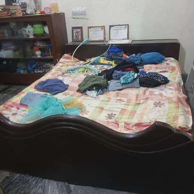 bed and side tables show case console