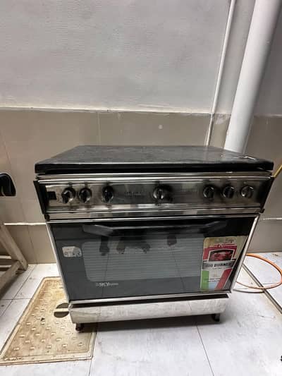 Microwave oven with stove