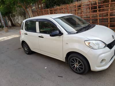 Toyota Passo x Pearl white 4 grade