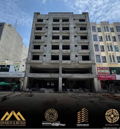 Madina Height 4: Ground Floor Commercial Shop No 3 For Sale in Bahria Town Sector B Umar Block Safari Park.