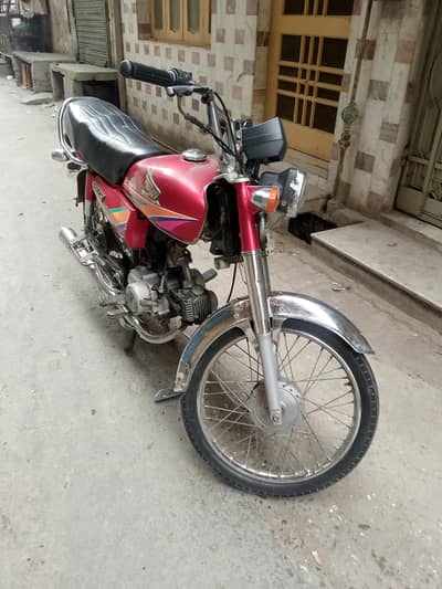 Honda CD 70,zero three four One two seven one nine two seven five