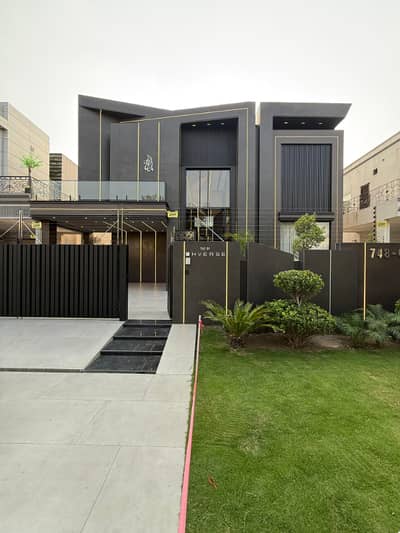 SYED BROTHERS PROUDLY OFFERS: 1-Kanal Elegant And Fully Maintained Semi Furnished Bungalow with Basement In The Best Block Of DHA Lahore.
