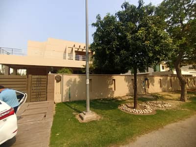 Fully Basement Double Unit 1 Kanal Bungalow 1 Kanal Lawn For Sale At Prime Location Of DHA Lahore Near To Park, Masjid And Commercial Market.