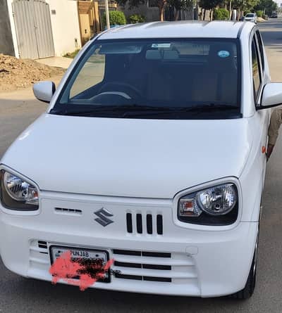 2023 model Alto VXL in white color for sale