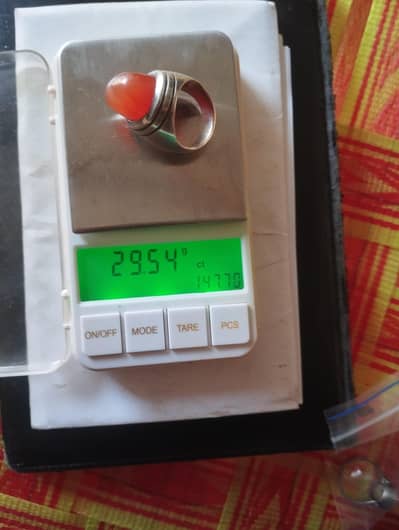 about 30 grams with aqeeq total weight