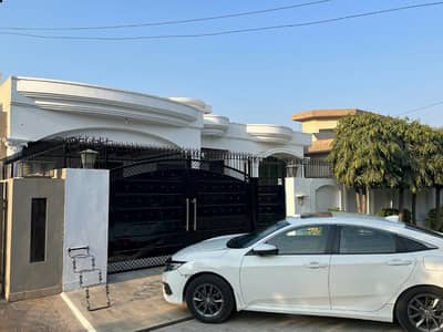 SYED BROTHERS PROUDLY OFFERS: 1-Kanal Elegant And Fully Maintained Single Story Bungalow Is Available In The Best Block Of DHA Lahore.