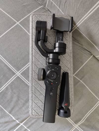 Zhiyun Smooth 4, a three-axis smartphone gimbal stabilizer